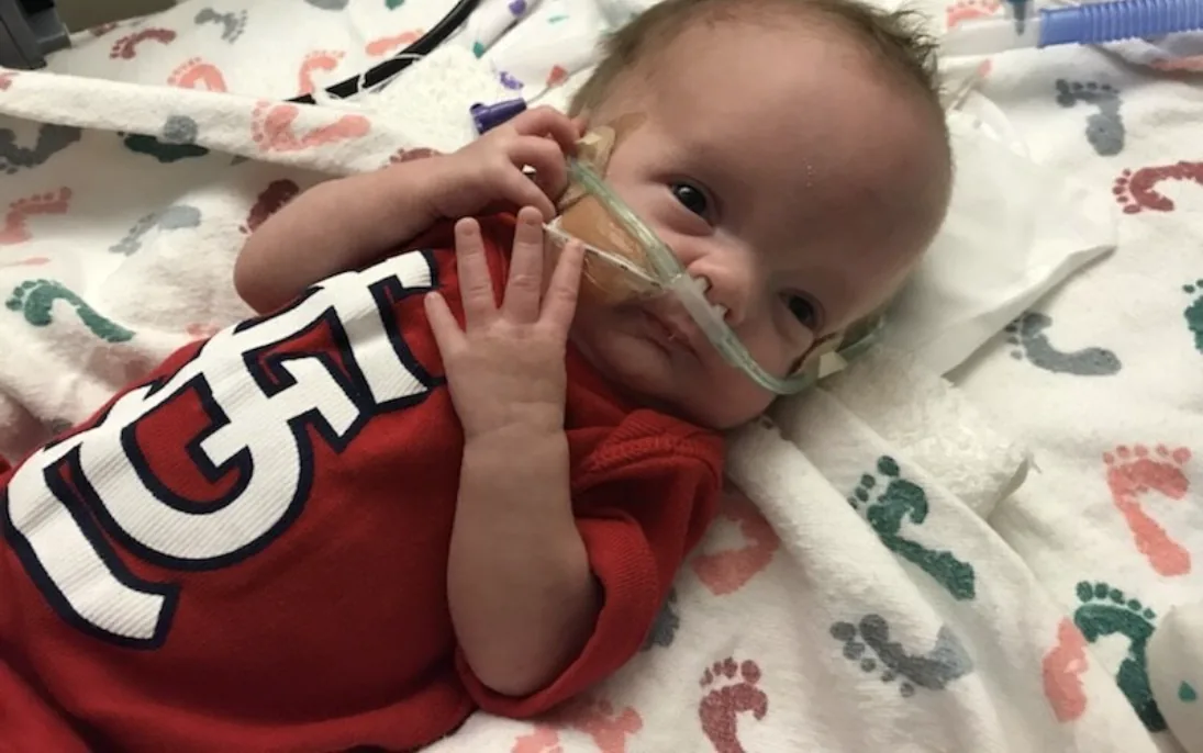 A medically fragile infant receiving hospital care