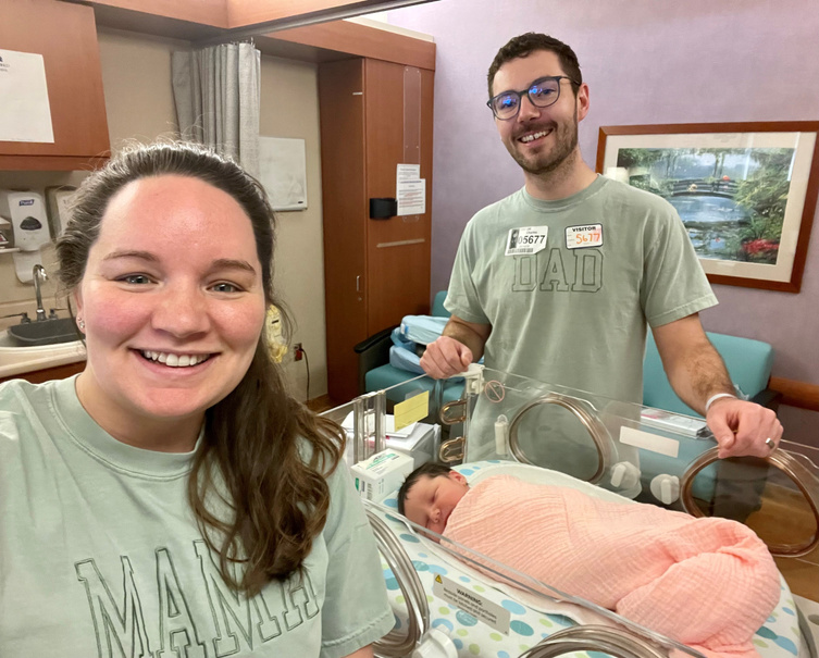 Rachel and her family with baby Eloise in the hospital